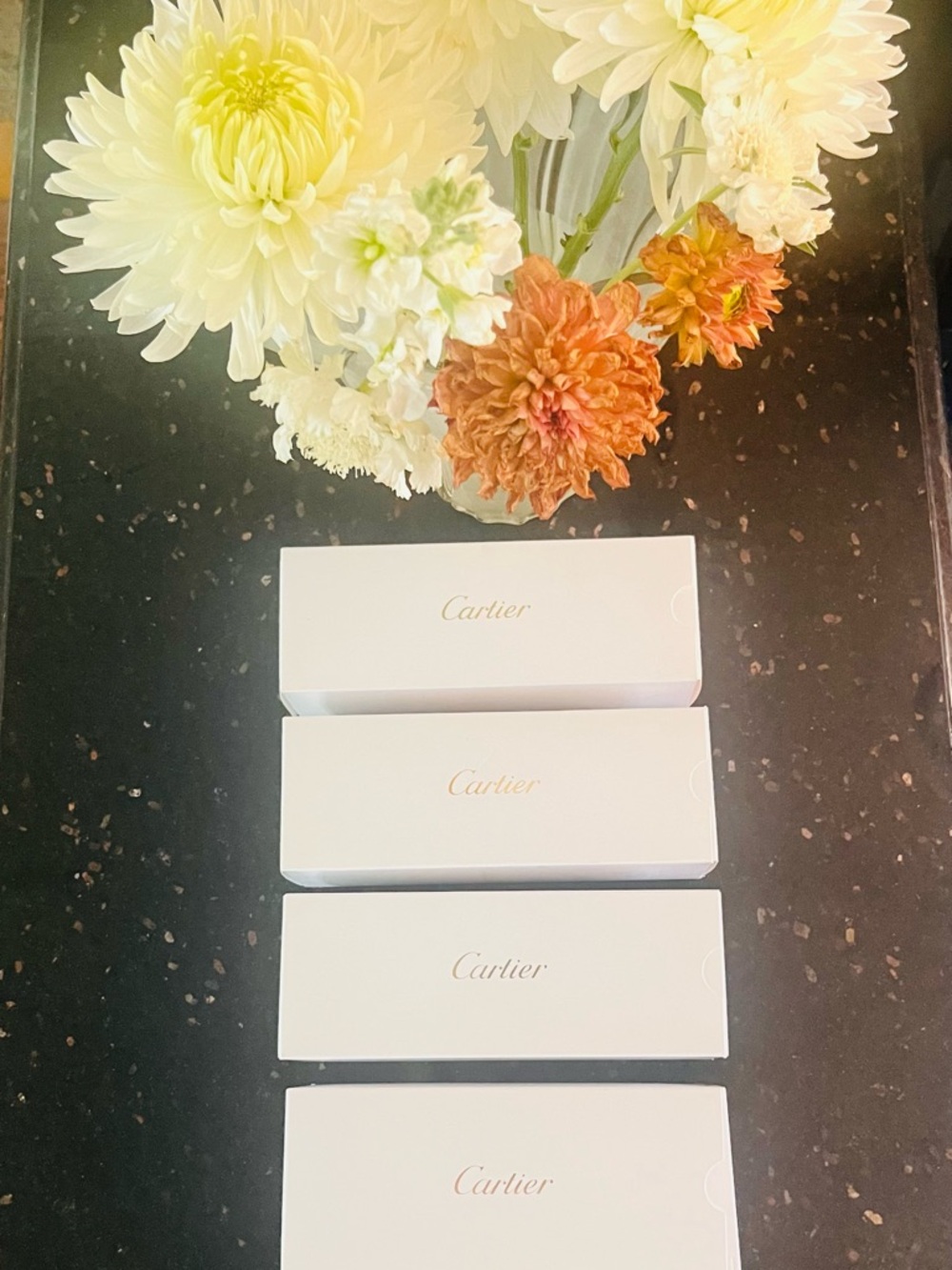 4 Cartier empty eyeglass boxes only.
Three small, one large.